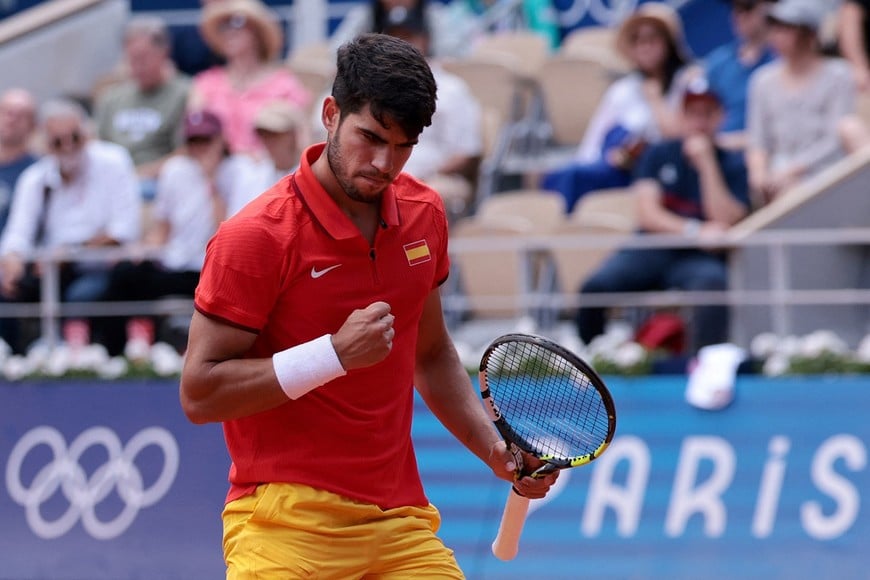 Paris 2024 Olympics - Tennis - Men's Singles semifinals - Roland-Garros Stadium, Paris, France - August 02, 2024.
Carlos Alcaraz of Spain reacts during his match against Felix Auger-Aliassime of Canada. REUTERS/Claudia Greco