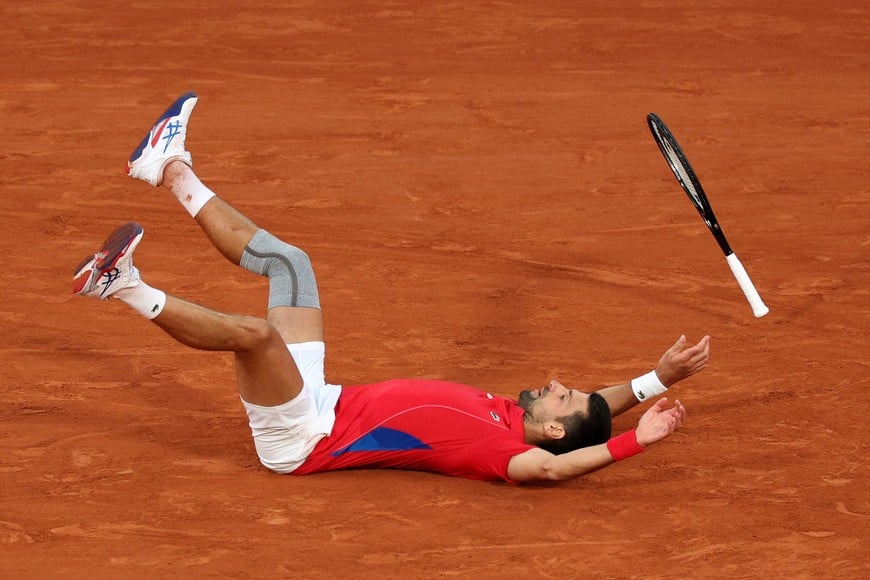 Paris 2024 Olympics - Tennis - Men's Singles semifinals - Roland-Garros Stadium, Paris, France - August 02, 2024.
Novak Djokovic of Serbia celebrates after winning his match against Lorenzo Musetti of Italy. REUTERS/Violeta Santos Moura