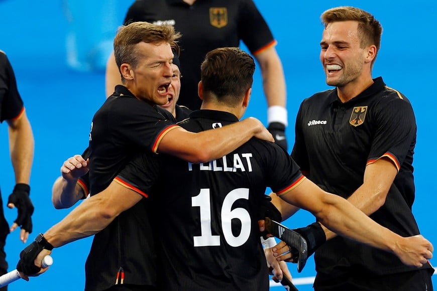 Paris 2024 Olympics - Hockey - Men's Quarter-final - Germany vs Argentina - Yves-du-Manoir Stadium, Colombes, France - August 04, 2024.
Gonzalo Peillat of Germany celebrates with teammates their second goal. REUTERS/Anushree Fadnavis