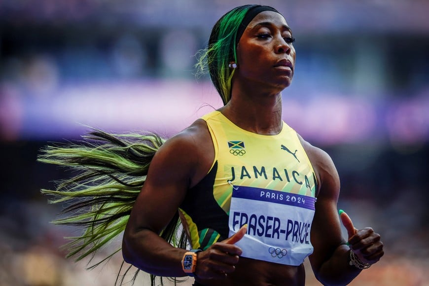 FILE PHOTO: Paris 2024 Olympics - Athletics - Women's 100m Round 1 - Stade de France, Saint-Denis, France - August 02, 2024.
Shelly-Ann Fraser-Pryce of Jamaica reacts after the heats. REUTERS/Sarah Meyssonnier            SEARCH "OLYMPIC COLOURS" FOR THIS STORY. SEARCH "OLYMPIC SIDELINES" FOR ALL STORIES.           NO RESALES. NO ARCHIVES