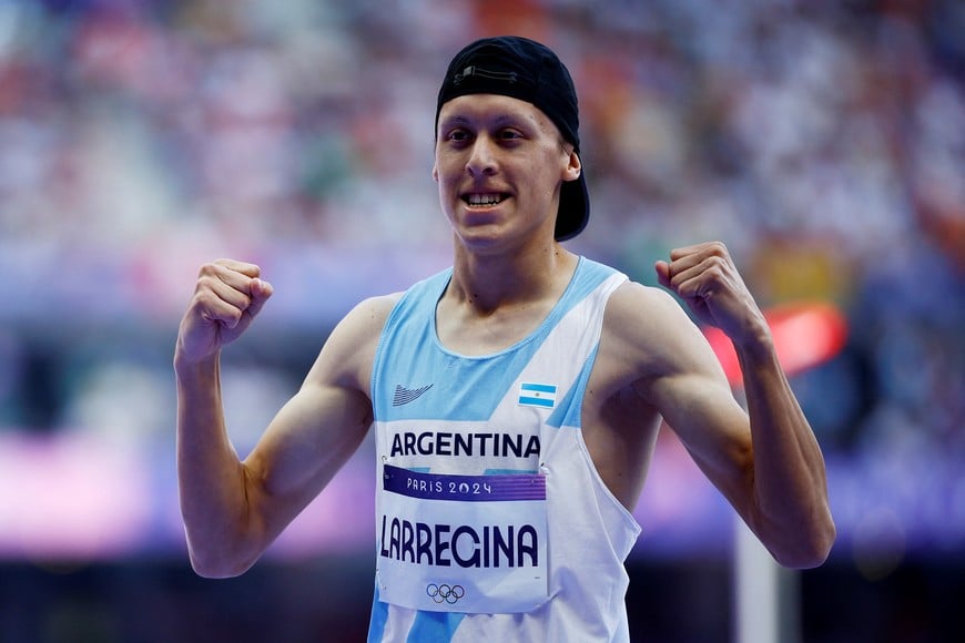 Paris 2024 Olympics - Athletics - Men's 400m Repechage Round - Stade de France, Saint-Denis, France - August 05, 2024.
Elian Larregina of Argentina reacts after winning heat 1 REUTERS/Sarah Meyssonnier