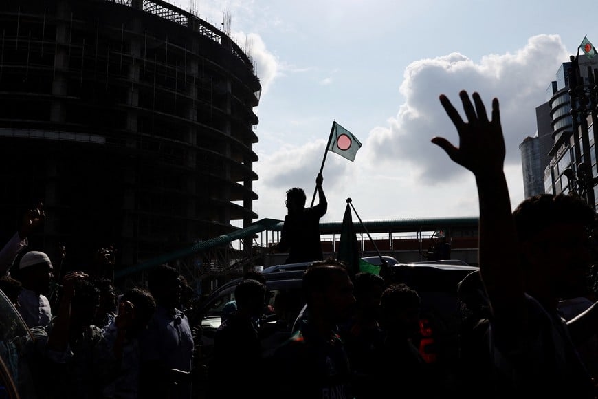 People celebrate the resignation of Bangladeshi Prime Minister Sheikh Hasina in Dhaka, Bangladesh, August 5, 2024. REUTERS/Mohammad Ponir Hossain