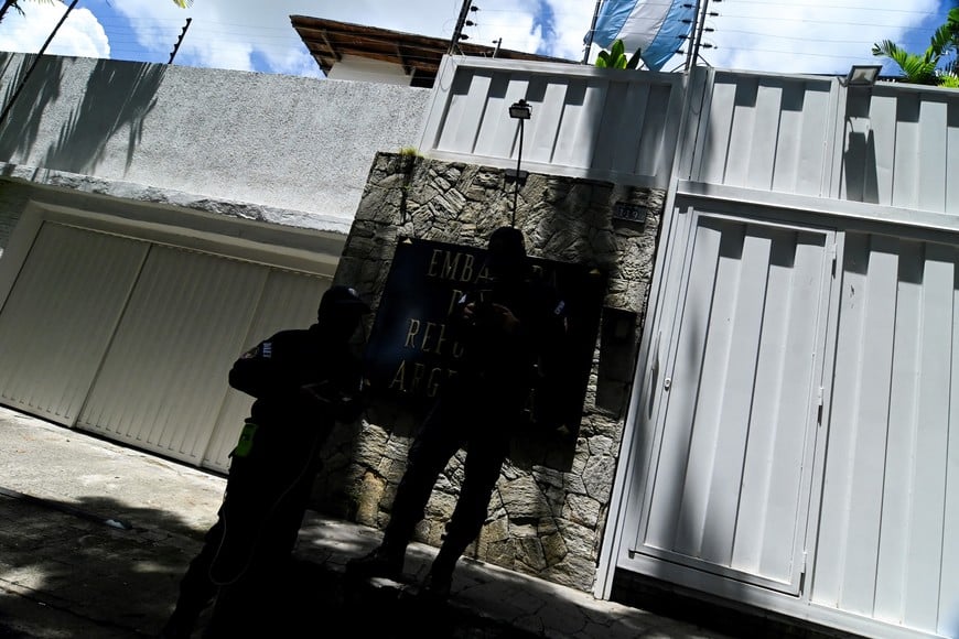 Members of the Directorate of Strategic and Tactical Actions of the Bolivarian National Police (DAET)
stand guard outside the residence of Argentina's ambassador where Venezuelan opposition members have sought asylum since March, in Caracas, Venezuela July 31, 2024. REUTERS/Stringer