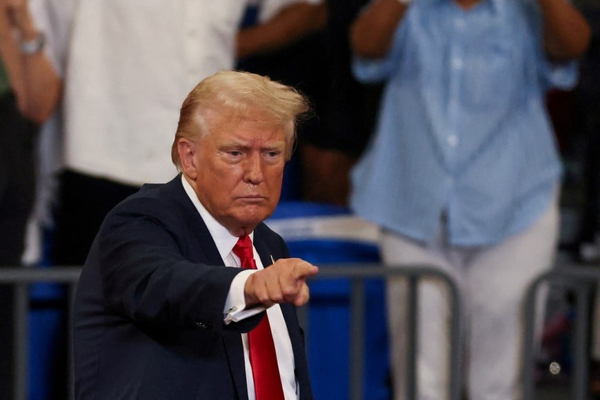 FILE PHOTO: Republican presidential nominee and former U.S. President Donald Trump gestures during a campaign rally held with Republican vice presidential nominee Senator JD Vance, in Atlanta, Georgia, U.S., August 3, 2024.  REUTERS/Umit Bektas/File Photo
