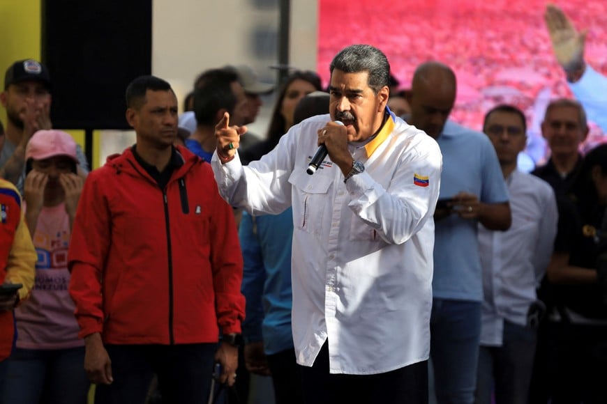 Venezuelan President Nicolas Maduro speaks during a march amid the disputed presidential election, in Caracas, Venezuela August 3, 2024. REUTERS/Maxwell Briceno