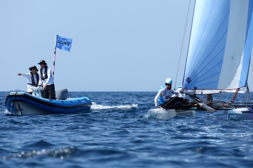 Paris 2024 Olympics - Sailing - Mixed Multihull Medal Race - Marseille Marina, Marseille, France - August 08, 2024. Mateo Majdalani of Argentina and Eugenia Bosco of Argentina in action. REUTERS/Andrew Boyers