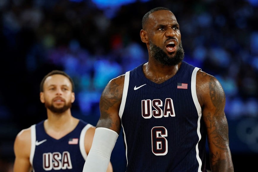 Paris 2024 Olympics - Basketball - Men's Gold Medal Game - France vs United States - Bercy Arena, Paris, France - August 10, 2024.
Lebron James of United States and Stephen Curry of United States react. REUTERS/Evelyn Hockstein