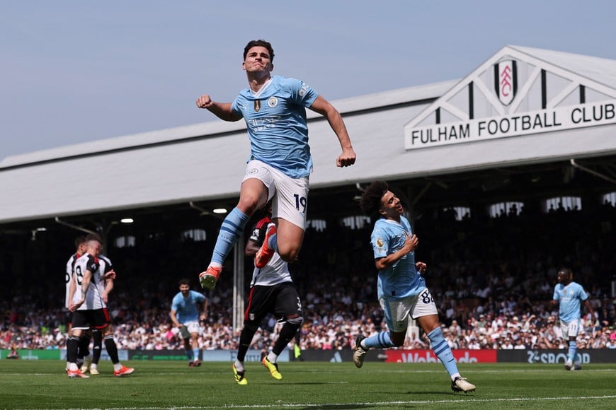 Soccer Football - Premier League - Fulham v Manchester City - Craven Cottage, London, Britain - May 11, 2024
Manchester City's Julian Alvarez celebrates scoring their fourth goal REUTERS/David Klein EDITORIAL USE ONLY. NO USE WITH UNAUTHORIZED AUDIO, VIDEO, DATA, FIXTURE LISTS, CLUB/LEAGUE LOGOS OR 'LIVE' SERVICES. ONLINE IN-MATCH USE LIMITED TO 120 IMAGES, NO VIDEO EMULATION. NO USE IN BETTING, GAMES OR SINGLE CLUB/LEAGUE/PLAYER PUBLICATIONS. PLEASE CONTACT YOUR ACCOUNT REPRESENTATIVE FOR FURTHER DETAILS..