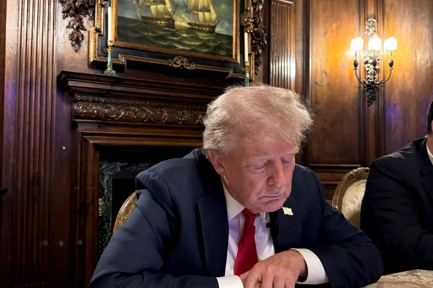 Republican presidential nominee and former U.S. President Donald Trump speaks as he participates in an interview with billionaire entrepreneur Elon Musk on the social media platform X, at Mar-a-Lago in Palm Beach, Florida, U.S., August 12, 2024 in this picture obtained from social media.  Margo Martin via X/via REUTERS  THIS IMAGE HAS BEEN SUPPLIED BY A THIRD PARTY. MANDATORY CREDIT. NO RESALES. NO ARCHIVES.