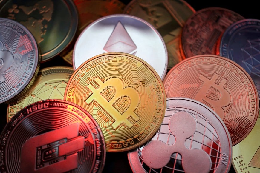 FILE PHOTO: Representations of cryptocurrencies including Bitcoin, Dash, Ethereum, Ripple and Litecoin are seen in this illustration picture taken June 2, 2021. REUTERS/Florence Lo/Illustration/File Photo