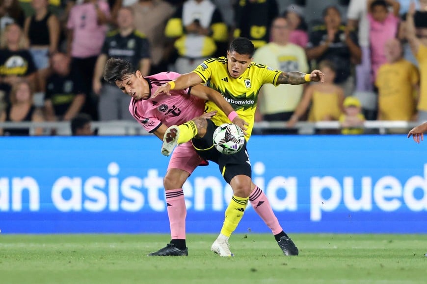 Aug 13, 2024; Columbus, Ohio, USA; Inter Miami CF midfielder Federico Redondo (55) fights for the ball with Columbus Crew forward Cucho Hernandez (9) during the second half at Lower.com. Mandatory Credit: Joseph Maiorana-USA TODAY Sports