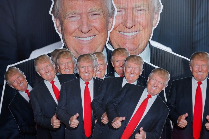 Merchandise in support of Republican presidential nominee and former U.S. President Donald Trump is displayed on the day of his campaign rally in Wilkes-Barre, Pennsylvania, U.S. August 17, 2024. REUTERS/Jeenah Moon