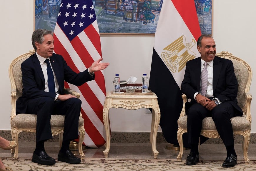 U.S. Secretary of State Antony Blinken and Egypt's Foreign Minister Badr Abdelatty react as they meet, in El-Alamein, Egypt, August 20, 2024. REUTERS/Kevin Mohatt/Pool