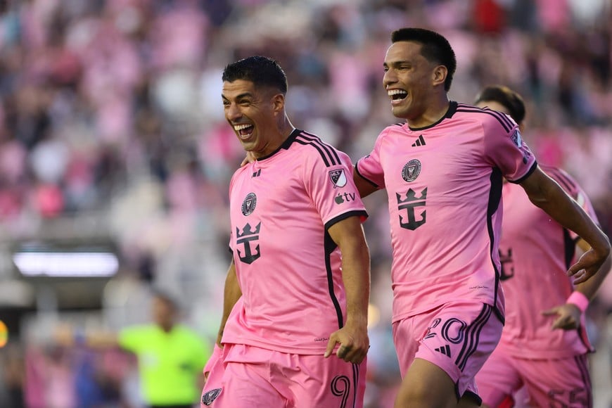 Aug 24, 2024; Fort Lauderdale, Florida, USA; Inter Miami forward Luis Suarez (9) celebrates a goal with midfielder Diego Gomez (20) in the first half against the FC Cincinnati at Chase Stadium. Mandatory Credit: Sam Navarro-USA TODAY Sports