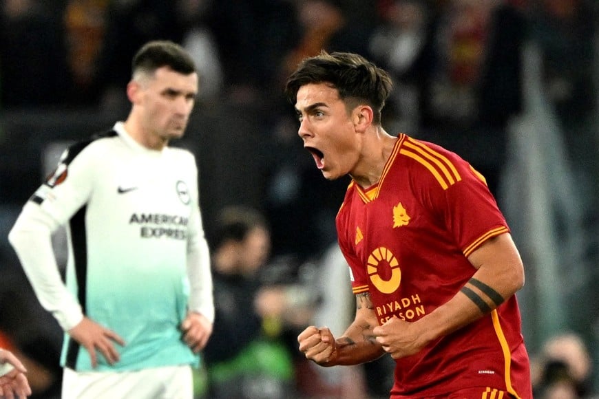 Soccer Football - Europa League - Round of 16 - First Leg - AS Roma v Brighton & Hove Albion - Stadio Olimpico, Rome, Italy - March 7, 2024
AS Roma's Paulo Dybala celebrates scoring their first goal REUTERS/Alberto Lingria