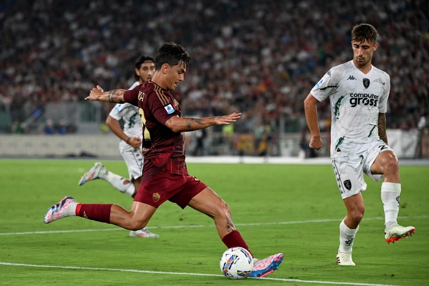 Soccer Football - Serie A - AS Roma v Empoli - Stadio Olimpico, Rome, Italy - August 25, 2024
AS Roma's Paulo Dybala in action with Empoli's Mattia Viti REUTERS/Alberto Lingria