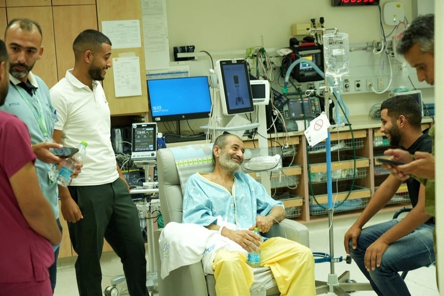 Qaid Farhan Alkadi, a Bedouin Israeli hostage who was kidnapped in the deadly October 7 Hamas attack, is reunited with loved ones after being rescued from Gaza by Israeli forces, at Soroka Medical Center in Beersheba, Israel, in this handout photo from August 27, 2024. Courtesy of the Government Press Office/Yossi Ifergan/Handout via REUTERS   THIS IMAGE HAS BEEN SUPPLIED BY A THIRD PARTY. MANDATORY CREDIT. NO RESALES. NO ARCHIVES.