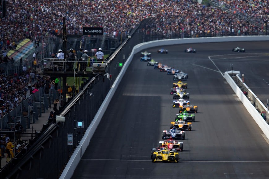 May 26, 2024; Indianapolis, Indiana, USA; Indycar Series driver Scott McLaughlin leads the field during the 108th running of the Indianapolis 500 at Indianapolis Motor Speedway. Mandatory Credit: Mark J. Rebilas-USA TODAY Sports