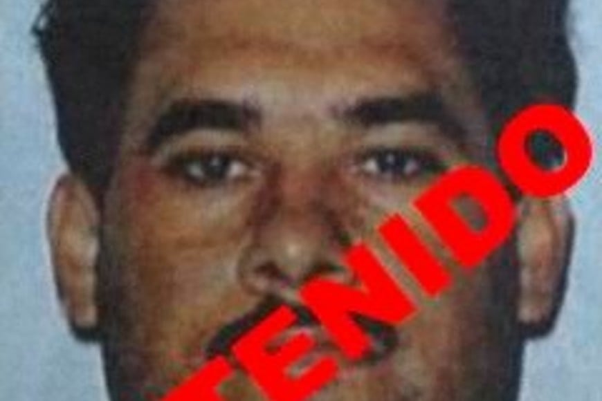 FILE PHOTO: An undated police handout picture shows extradited Gulf cartel leader Osiel Cardenas with the word "Arrested" printed on it.  REUTERS/Courtesy of the Procuraduria General de la Republica QUALITY FROM SOURCE FOR EDITORIAL USE ONLY. NOT FOR SALE FOR MARKETING OR ADVERTISING CAMPAIGNS/File Photo