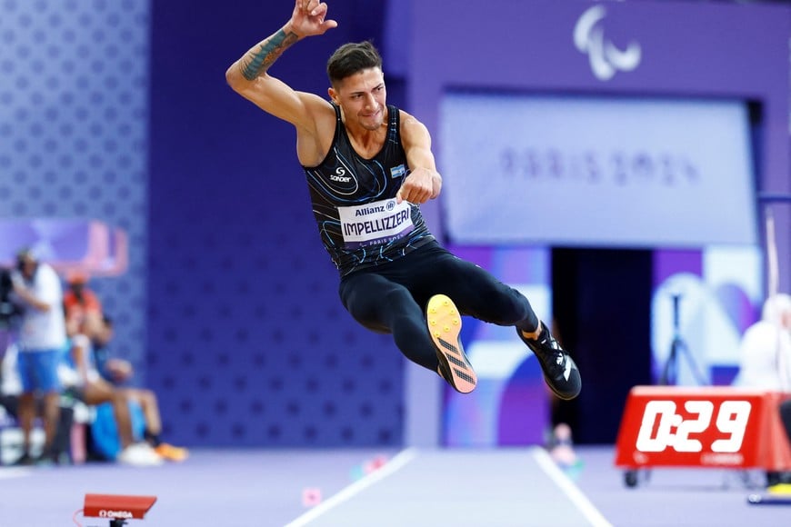 Paris 2024 Paralympics - Athletics - Men's Long Jump - T37 Final - Stade de France, Saint-Denis, France - September 3, 2024
Brian Lionel Impellizzeri of Argentina in action REUTERS/Carlos Garcia Rawlins