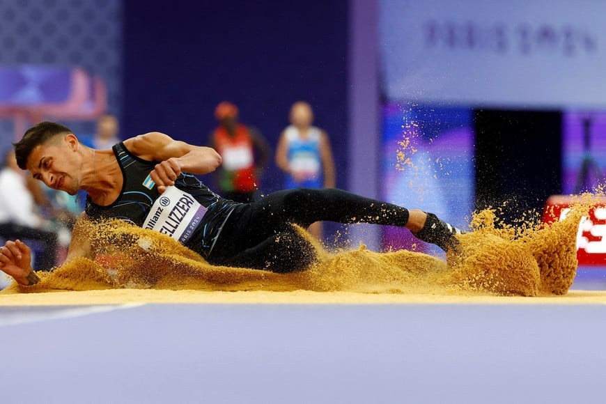 Paris 2024 Paralympics - Athletics - Men's Long Jump - T37 Final - Stade de France, Saint-Denis, France - September 3, 2024
Brian Lionel Impellizzeri of Argentina in action REUTERS/Carlos Garcia Rawlins