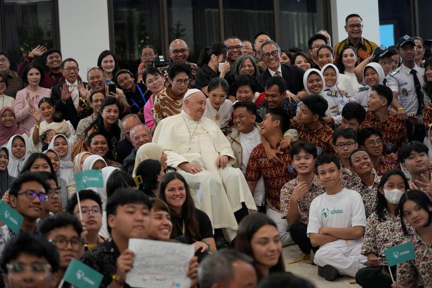 Pope Francis interacts with the young people of Scholas Occurrentes at Graha Pemuda Youth Center in Jakarta, Indonesia, Wednesday, Sept. 4, 2024.     Tatan Syuflana/Pool via REUTERS