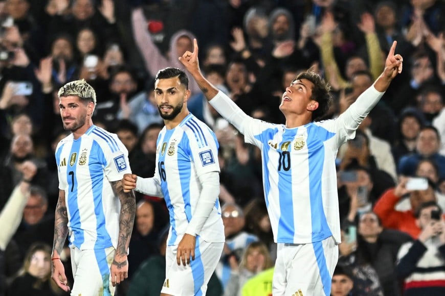 Soccer Football - World Cup - South American Qualifiers - Argentina v Chile - Estadio Mas Monumental, Buenos Aires, Argentina - September 5, 2024
Argentina's Paulo Dybala celebrates scoring their third goal with teammates REUTERS/Rodrigo Valle