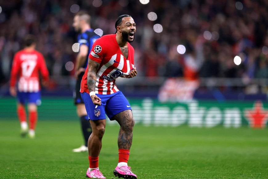 Soccer Football - Champions League - Round of 16 - Second Leg - Atletico Madrid v Inter Milan - Metropolitano, Madrid, Spain - March 13, 2024 
Atletico Madrid's Memphis Depay celebrates scoring their second goal REUTERS/Juan Medina