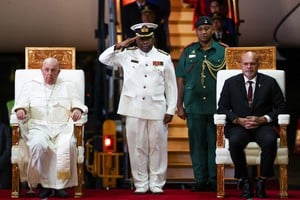 Pope Francis and Papua New Guinea's Deputy Prime Minister John Rosso look on during a welcome ceremony, after Pope's landing at Port Moresby Jackson International Airport, in Port Moresby, Papua New Guinea, September 6, 2024. REUTERS/Guglielmo Mangiapane