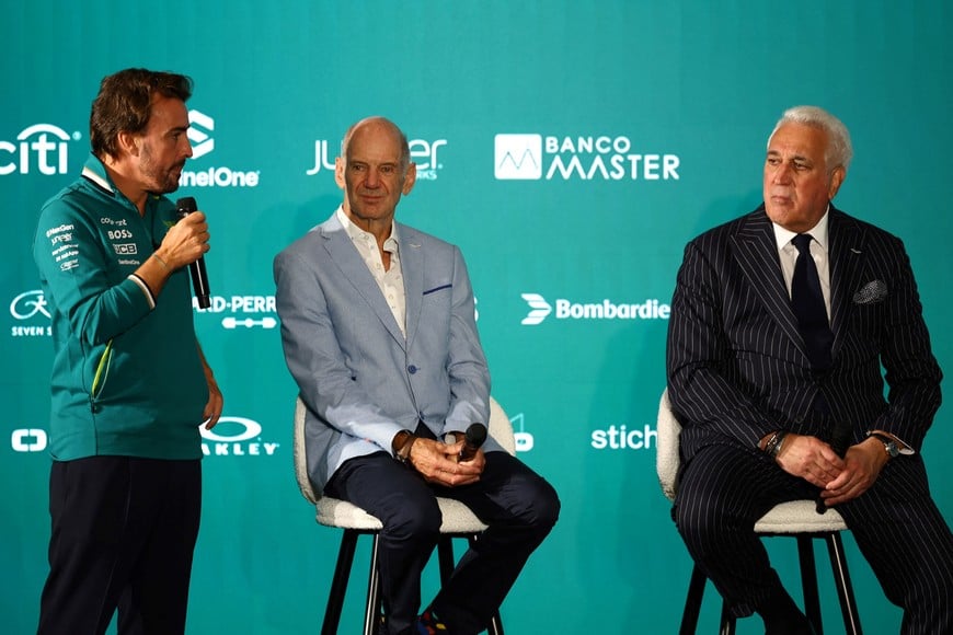 Formula One F1 - Aston Martin Press Conference - AMR Technology Campus, Silverstone, Britain - September 10, 2024
Aston Martin's Fernando Alonso with chairperson Lawrence Stroll and new managing technical partner Adrian Newey during the press conference Action Images via Reuters/Andrew Boyers