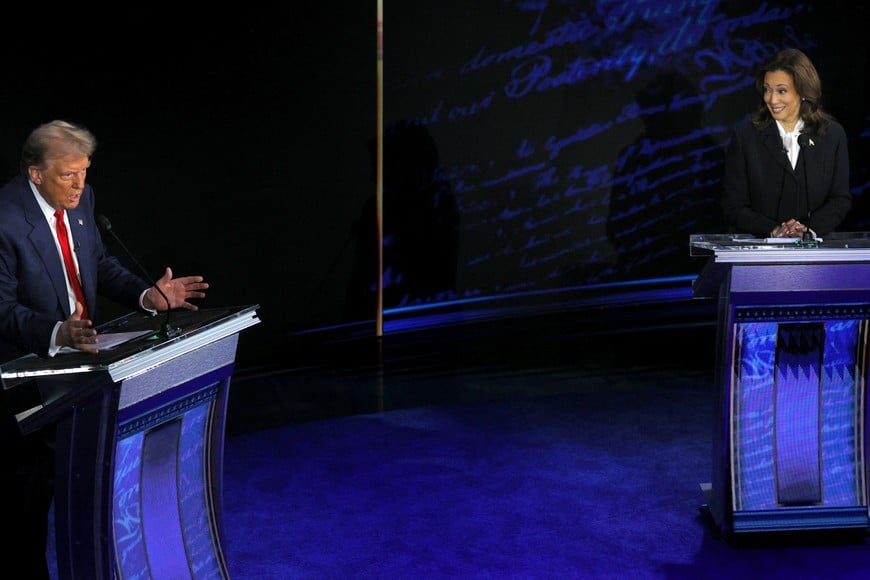 Democratic presidential nominee, U.S. Vice President Kamala Harris reacts to what Republican presidential nominee, former U.S. President Donald Trump says during a presidential debate hosted by ABC in Philadelphia, Pennsylvania, U.S.,  September 10, 2024 REUTERS/Brian Snyder