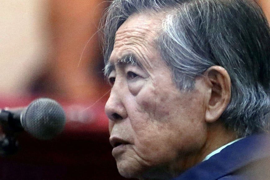 FILE PHOTO: Former President of Peru Alberto Fujimori attends a trial as a witness at the navy base in Callao, Peru March 15, 2018. Picture taken through a window. REUTERS/Mariana Bazo/File Photo