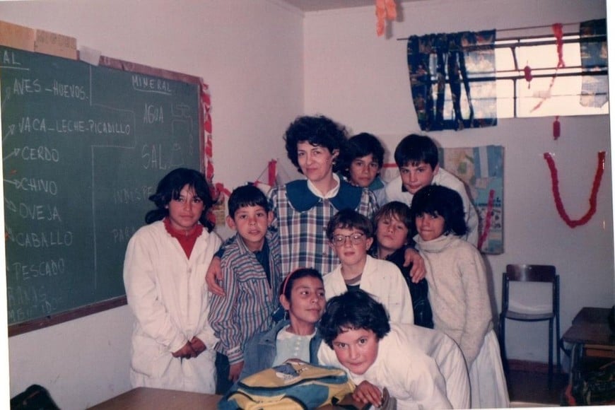 Lidia Tabella y sus alumnos.