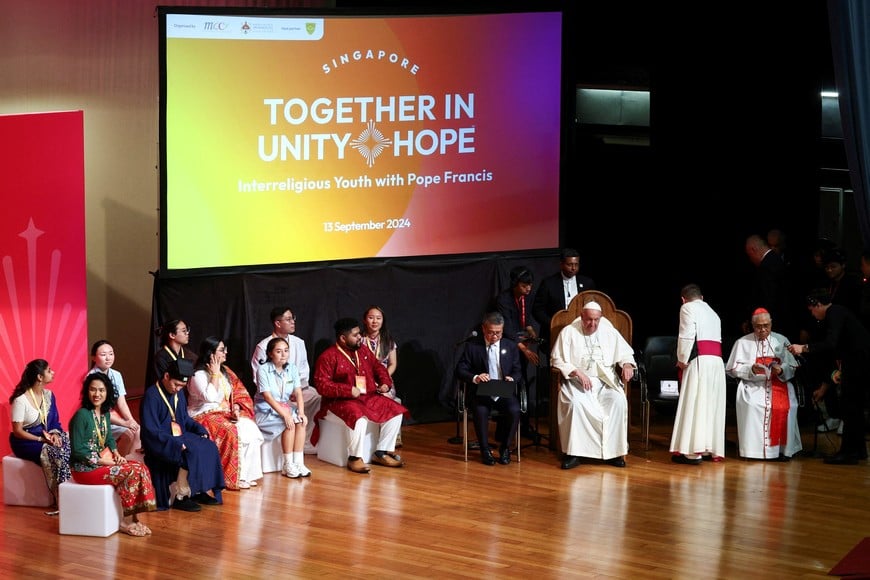 Pope Francis attends an inter-religious meeting with young people at the Catholic Junior College in Singapore, September 13, 2024. REUTERS/Guglielmo Mangiapane