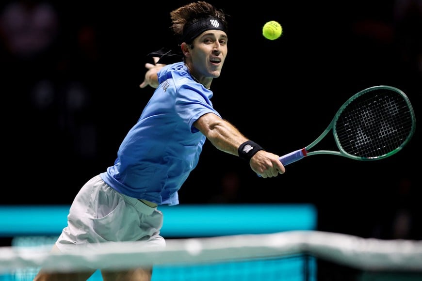 Tennis - Davis Cup - Group D - Britain v Argentina - AO Arena, Manchester, Britain - September 13, 2024  
Argentina's Tomas Martin Etcheverry in action during his match against Britain's Daniel Evans Action Images via Reuters/Craig Brough