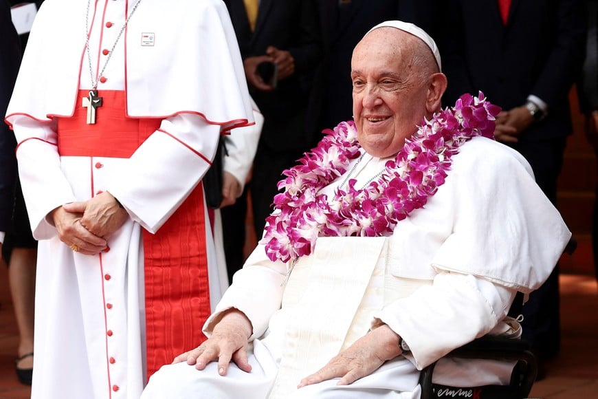 Pope Francis arrives to attend an inter-religious meeting with young people at the Catholic Junior College in Singapore, September 13, 2024. REUTERS/Guglielmo Mangiapane