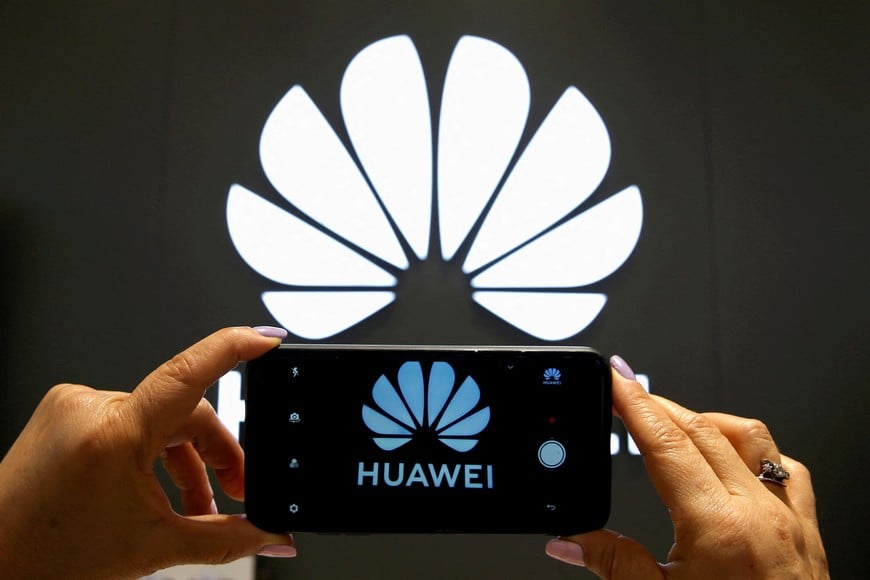 A Huawei logo is seen on a cell phone screen in their store at Vina del Mar, Chile July 18, 2019. REUTERS/Rodrigo Garrido