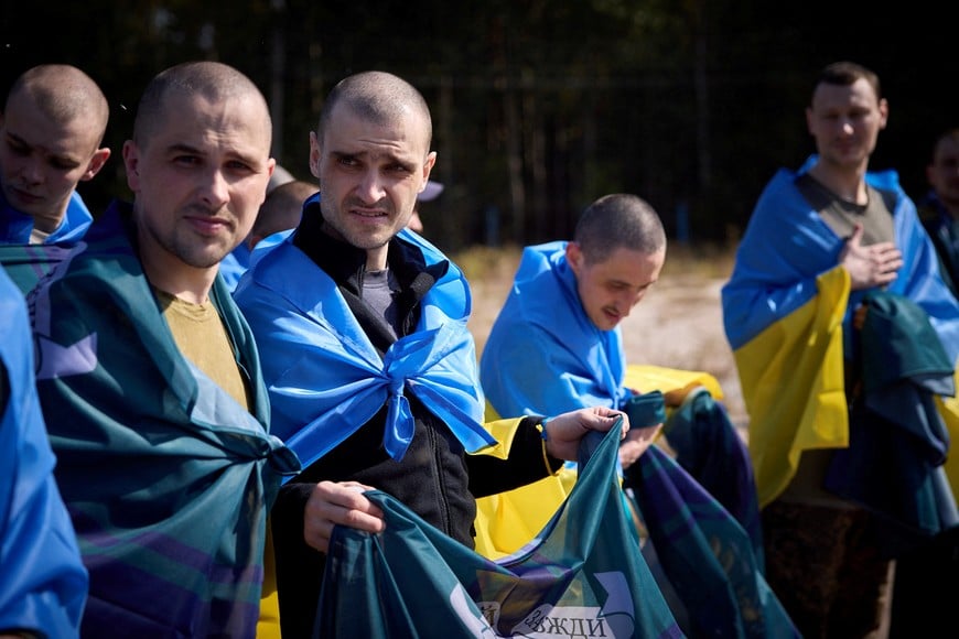 Ukrainian prisoners of war (POWs) are seen after a swap, amid Russia's attack on Ukraine, at an unknown location in Ukraine, in this handout picture released on September 14, 2024. Ukrainian Presidential Press Service/Handout via REUTERS ATTENTION EDITORS - THIS IMAGE HAS BEEN SUPPLIED BY A THIRD PARTY.