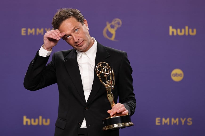 Ebon Moss-Bachrach poses with the award for Outstanding Supporting Actor In A Comedy Series for "The Bear" at the 76th Primetime Emmy Awards in Los Angeles, California, U.S., September 15, 2024. REUTERS/Mike Blake