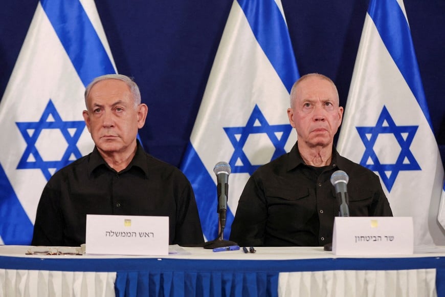 FILE PHOTO: Israeli prime minister Benjamin Netanyahu and defense minister Yoav Gallant during a press conference in the Kirya military base in Tel Aviv , Israel , 28 October  2023.    ABIR SULTAN POOL/Pool via REUTERS/File Photo