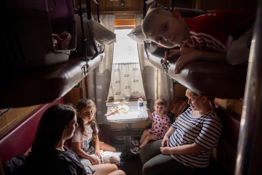 Serhiy from Selydove sits on an evacuation train as local residents flee Russian troop advances in Pokrovsk, Ukraine, amid Russia's attack on Ukraine, August 22, 2024.  REUTERS/Thomas Peter