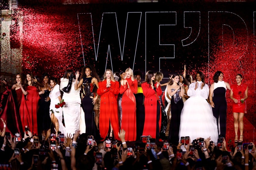 Aja Naomi King, Eva Longoria, Aishwarya Rai, Yseult, Cindy Bruna, Cara Delevingne, Kendall Jenner, Luma Grothe, Alia Bhatt, Marie Bochet and Liya Kebede stand during a public show named "Walk Your Worth" organised by French cosmetics group L'Oreal near the Opera Garnier as part of Paris Fashion Week, in Paris, France, September 23, 2024. REUTERS/Johanna Geron