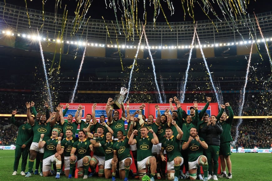 Rugby Union - Rugby Championship - South Africa v New Zealand - Cape Town Stadium, Cape Town, South Africa - September 7, 2024
South Africa players celebrate with a trophy after the match REUTERS/Esa Alexander