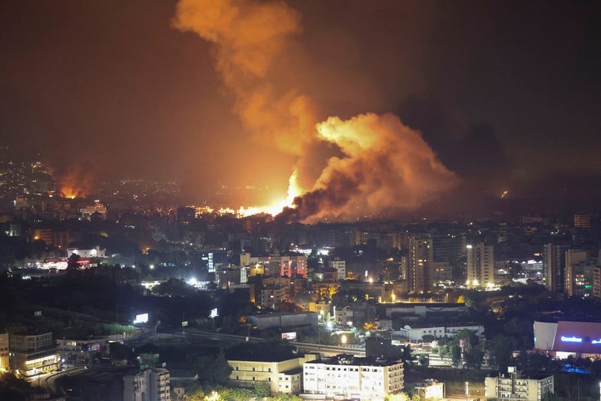 Smoke billows over Beirut's southern suburbs, amid ongoing hostilities between Hezbollah and Israeli forces, as seen from Sin El Fil, Lebanon, September 28, 2024. REUTERS/Mohamed Azakir