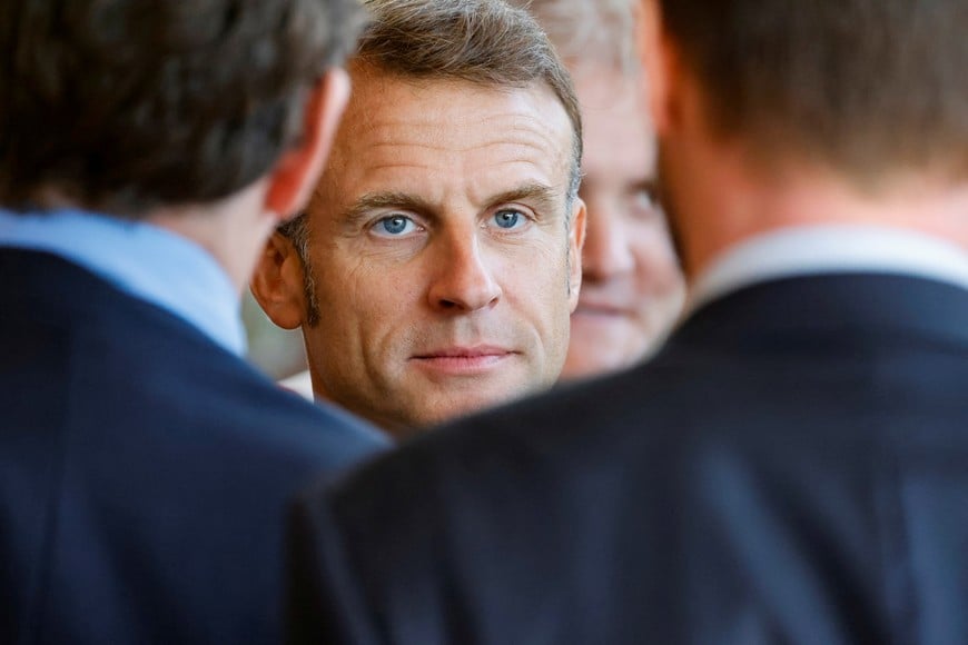 France's President Emmanuel Macron looks on as he visits the "Nanterre Arboretum", an office campus entirely from wood in Nanterre near Paris, France, on September 19, 2024.   LUDOVIC MARIN/Pool via REUTERS