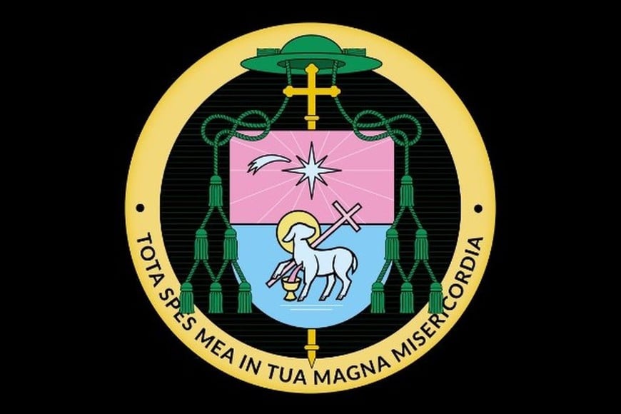 El escudo que eligió Mons. Matías Vecino con los colores de la Virgen de Guadalupe, el cordero pascual (símbolo de la muerte y resurrección de Jesucristo), la estrella de Navidad y la inscripción “Toda mi esperanza está en tu gran misericordia”. Gentileza