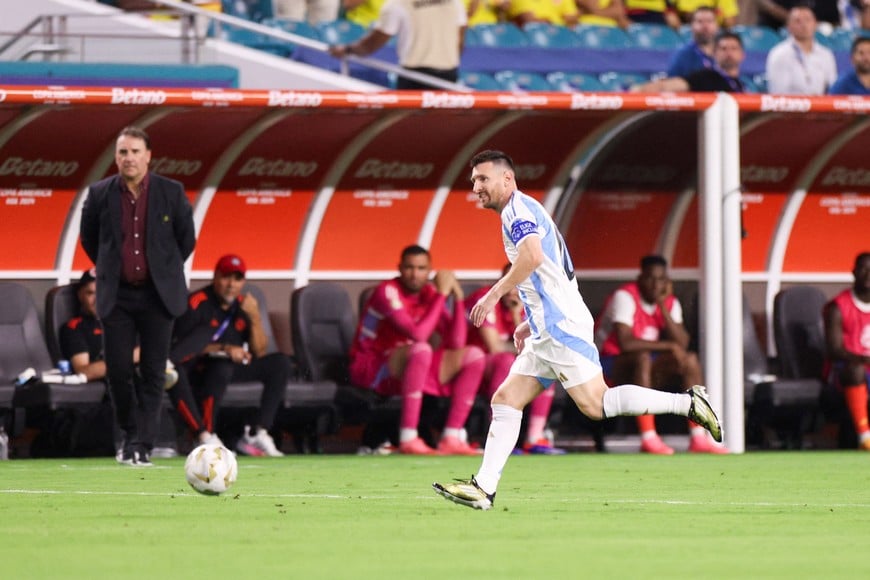 Jul 14, 2024; Miami, FL, USA; Argentina forward Lionel Messi (10) controls the ball against Colombia in the second half during the Copa America Final at Hard Rock Stadium. Mandatory Credit: Nathan Ray Seebeck-USA TODAY Sports