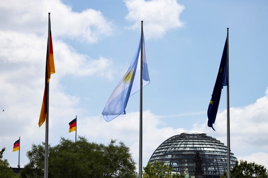 Flags of Germany, Argentina and the European Union are displayed on the day German Chancellor Olaf Scholz receives Argentine President Javier Milei at the Chancellery in Berlin, Germany, June 23, 2024. REUTERS/Liesa Johannssen