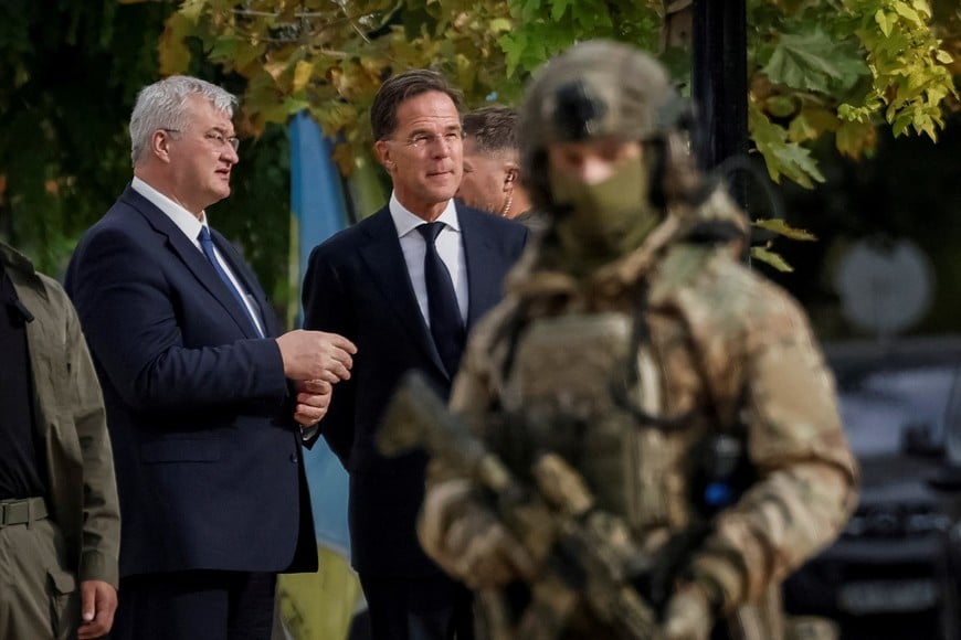 NATO Secretary-General Mark Rutte listens Ukraine's Foreign Minister Andrii Sybiha, amid Russia's attack on Ukraine, during his visit in Kyiv, Ukraine October 3, 2024. REUTERS/Gleb Garanich