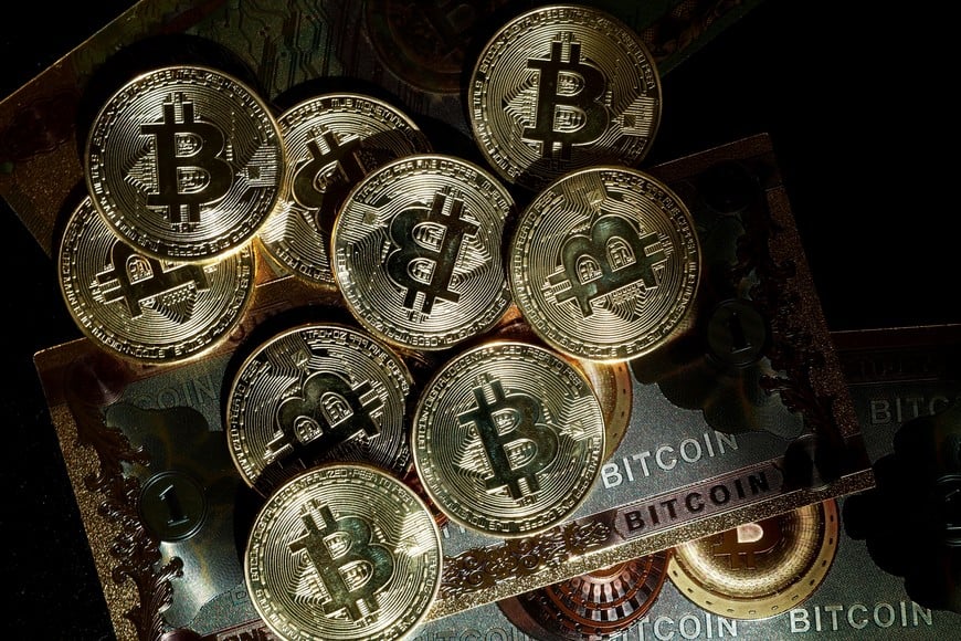 FILE PHOTO: Representations of cryptocurrency Bitcoin are seen in this illustration picture taken in Paris, France, March 9, 2024. REUTERS/Benoit Tessier/Illustration/File Photo